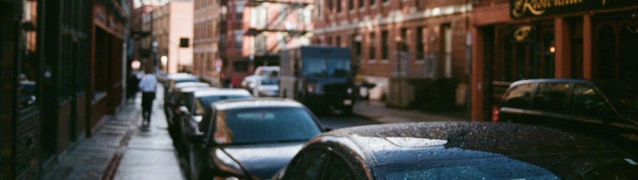 A row of cars on a street