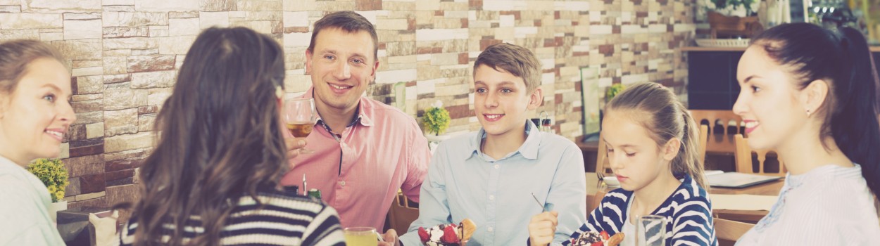 A family sitting around a table eating