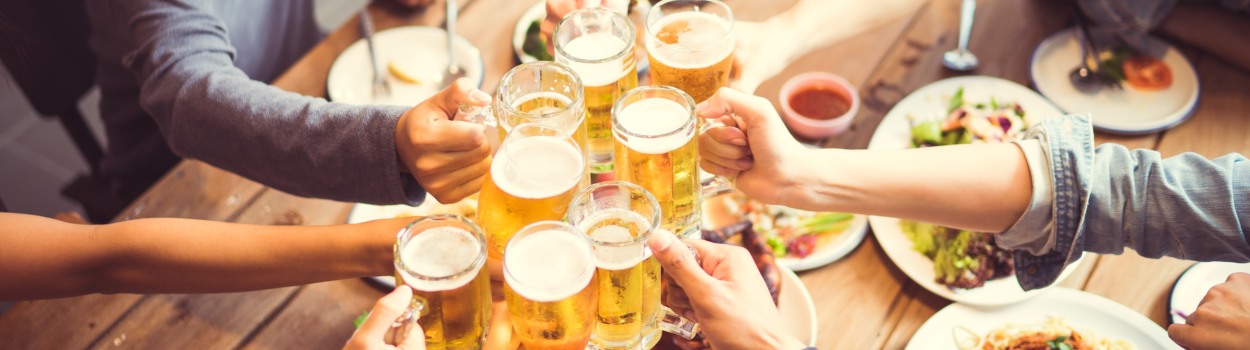 A group of friends toasting drinks.